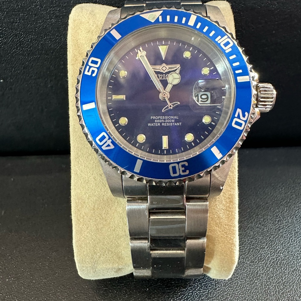 Invicta Silver Watch with Blue Accents